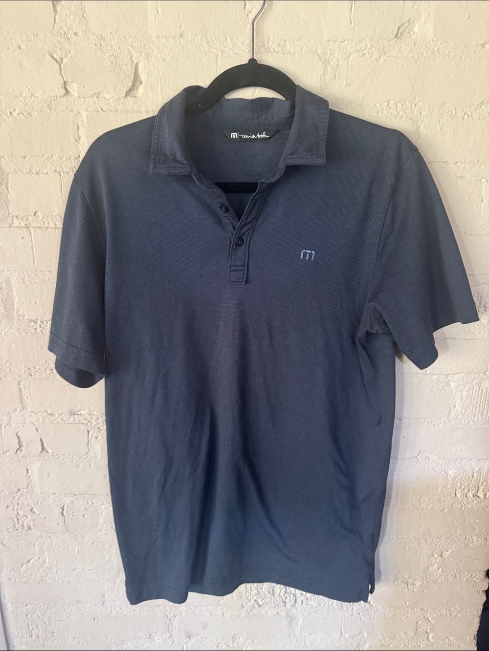 Travis Mathew Navy Short-Sleeve Polo with Subtle Logo